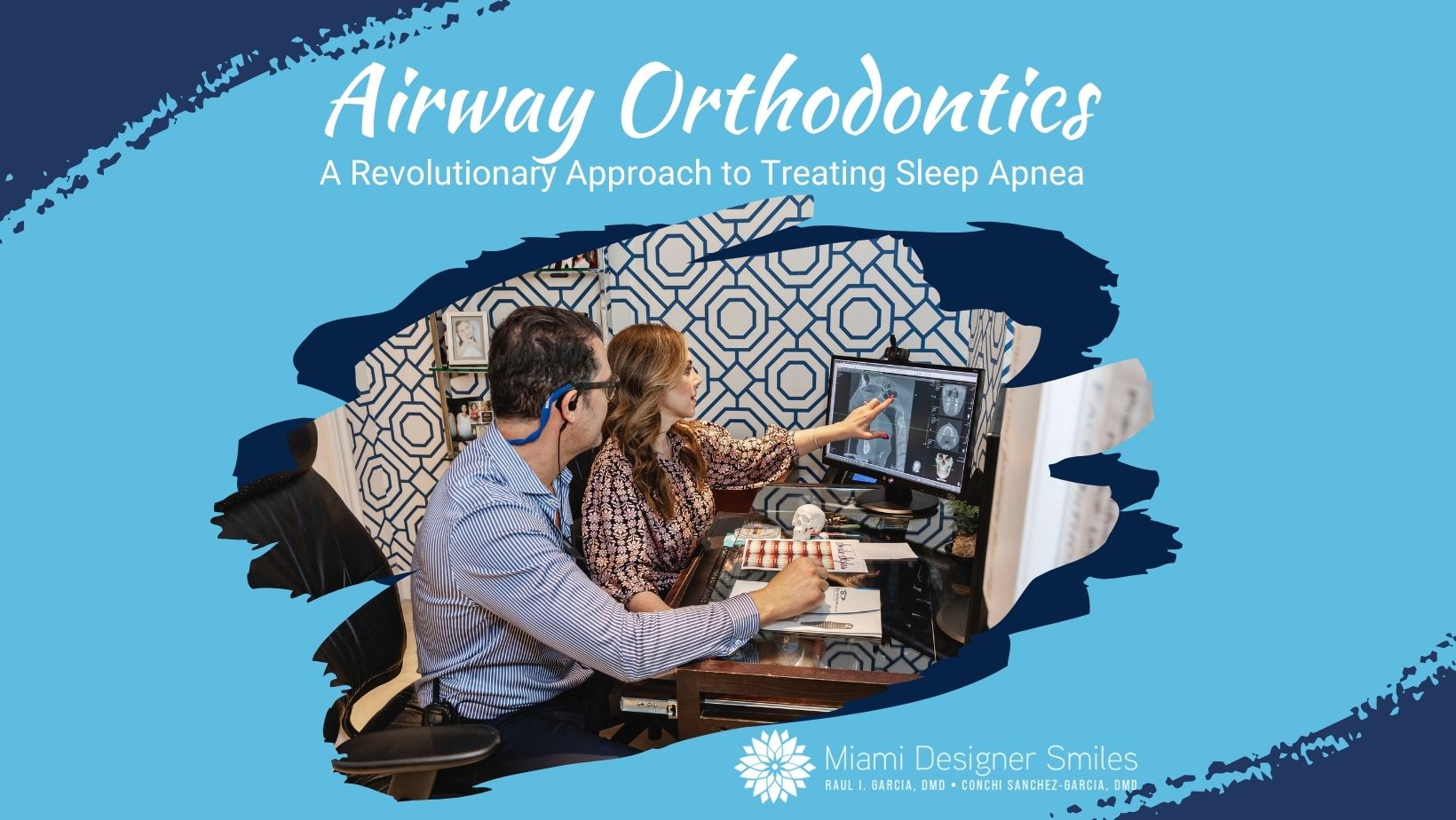 Two dental professionals examine and discuss a digital dental scan on a computer in an orthodontic office, highlighting the benefits of airway orthodontics for effective sleep apnea treatment.