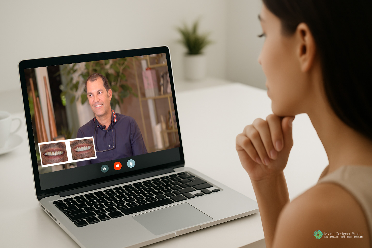 A woman participates in a virtual cosmetic dental consultation on her laptop with a man who is showing before-and-after images of dental work.