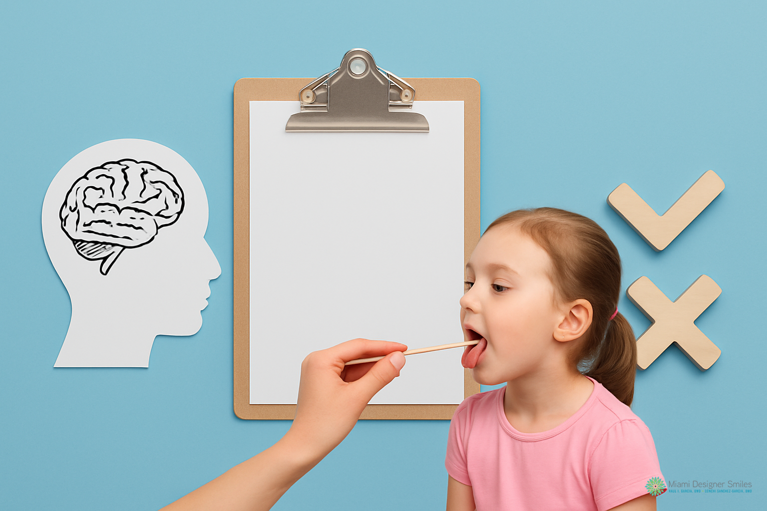A child in a pink shirt has her mouth open while an adult holds a tongue depressor, demonstrating myofunctional therapy for children; behind them are a clipboard, brain illustration, and checkmark and X symbols on the wall.